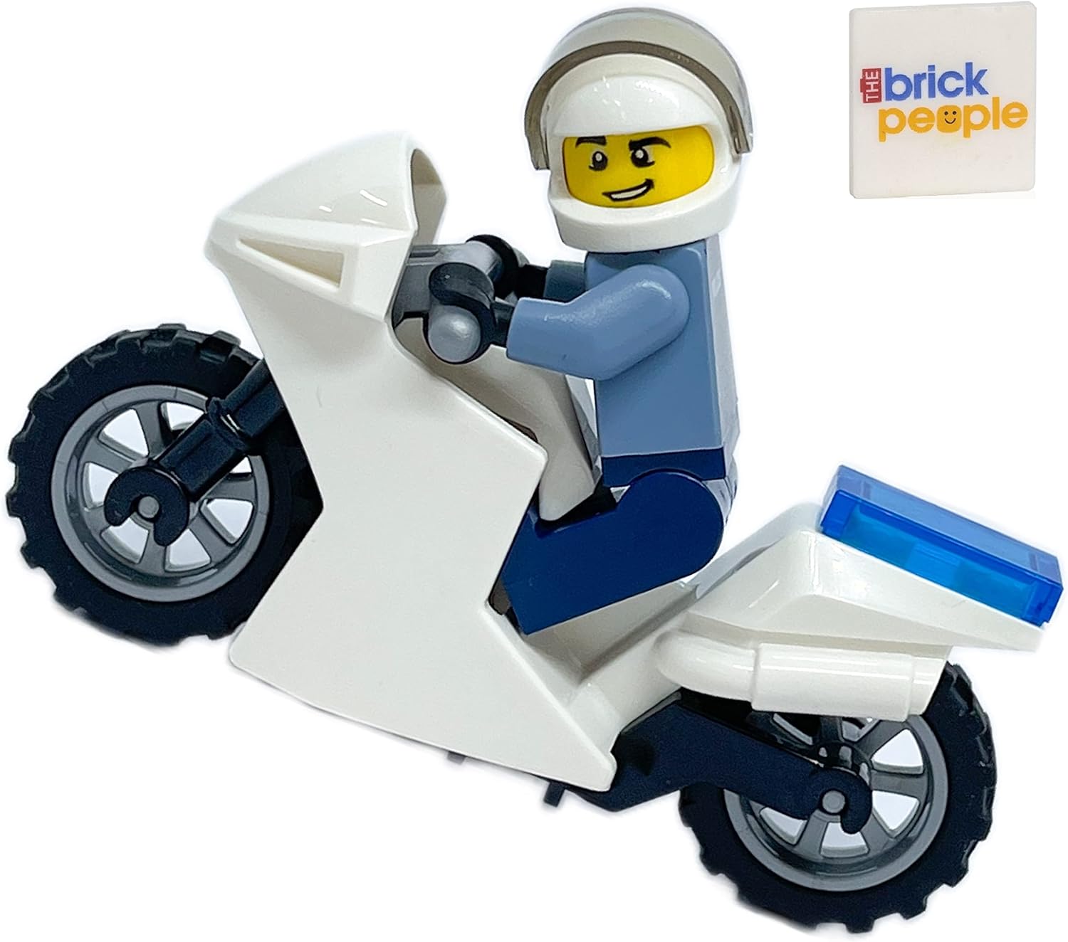 A man on a lego motocycle